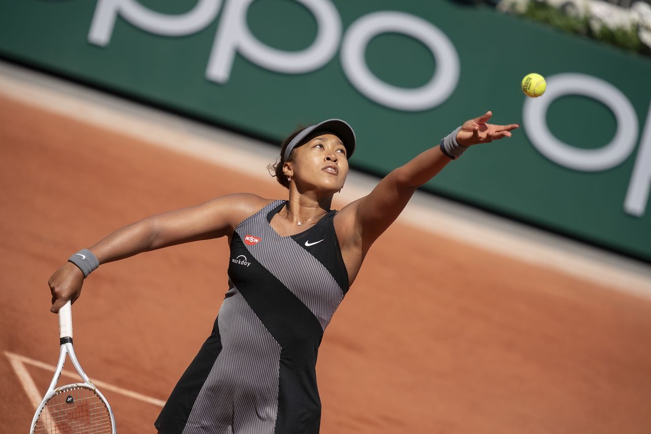 May 30, 2021; Paris, France; Naomi Osaka (JPN) in action during her match against Patricia Maria Tig (ROU) at Roland Garros Stadium. Mandatory Credit: Susan Mullane-USA TODAY Sports