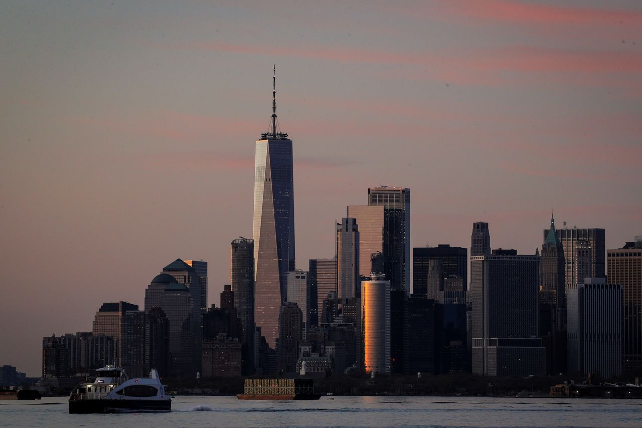 FILE PHOTO: The Manhattan skyline is seen during sunset from the Brooklyn borough of New York City, during the outbreak of the coronavirus disease (COVID-19), U.S., April 20, 2020. REUTERS/Brendan McDermid