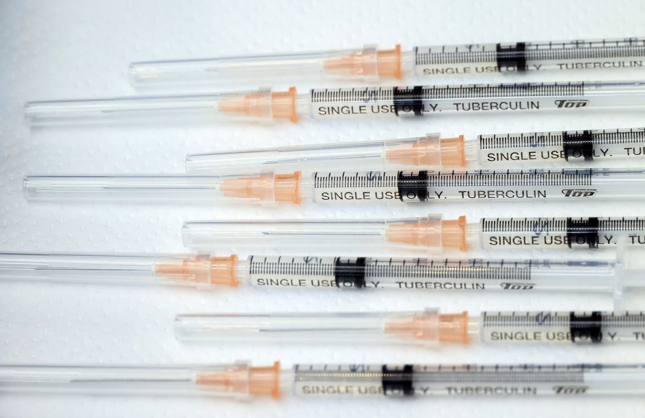 FILE PHOTO: Syringes with doses of the coronavirus disease (COVID-19) vaccine are displayed at the Tokyo Metropolitan Cancer and Infectious Diseases Center Komagome Hospital in Tokyo, Japan March 5, 2021. Yoshikazu Tsuno/Pool via REUTERS