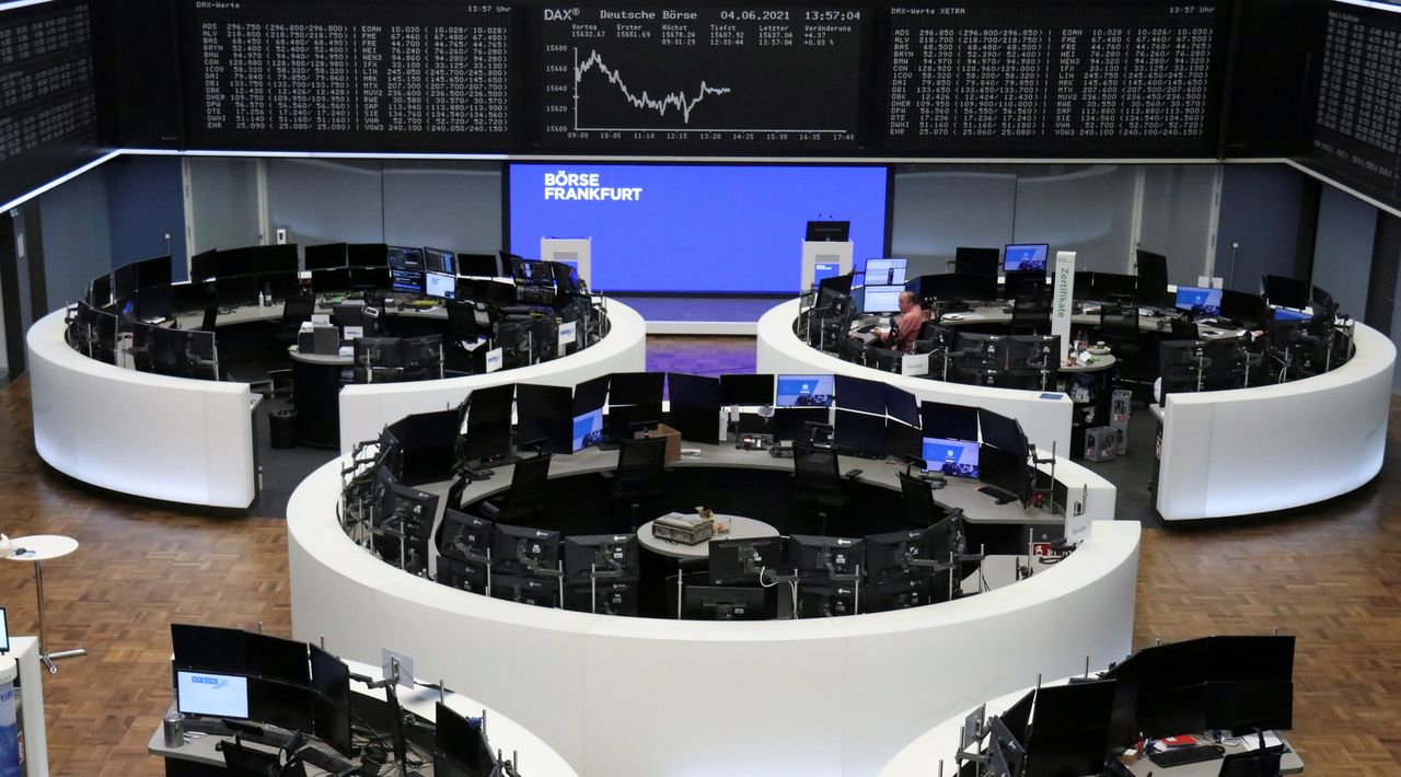 FILE PHOTO: The German share price index DAX graph is pictured at the stock exchange in Frankfurt, Germany, June 4, 2021. REUTERS/Staff