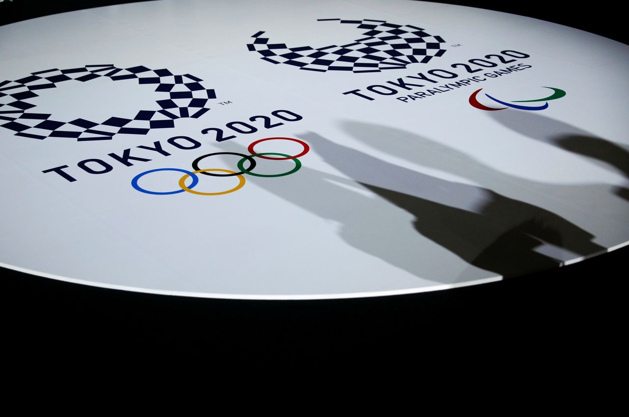 FILE PHOTO: The emblems of the Tokyo 2020 Olympic and Paralympic Games are displayed during an unveiling event of the items that will be used for the victory ceremonies, at Ariake Arena in Tokyo, Japan June 3, 2021. REUTERS/Issei Kato/Pool