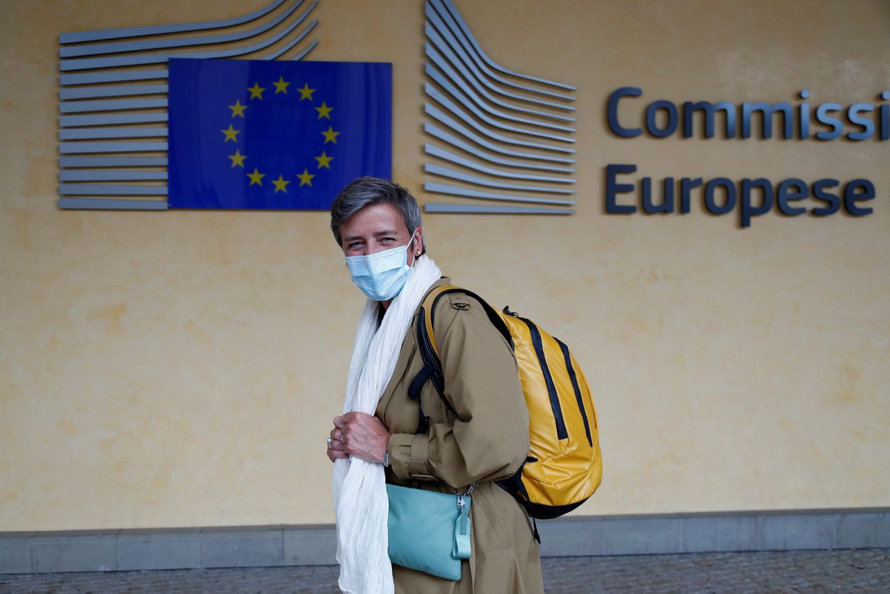 FILE PHOTO: European Competition Commissioner Margrethe Vestager wearing a protective mask leaves the EU Commission headquarters in Brussels, Belgium July 15, 2020. REUTERS/Francois Lenoir/File Photo