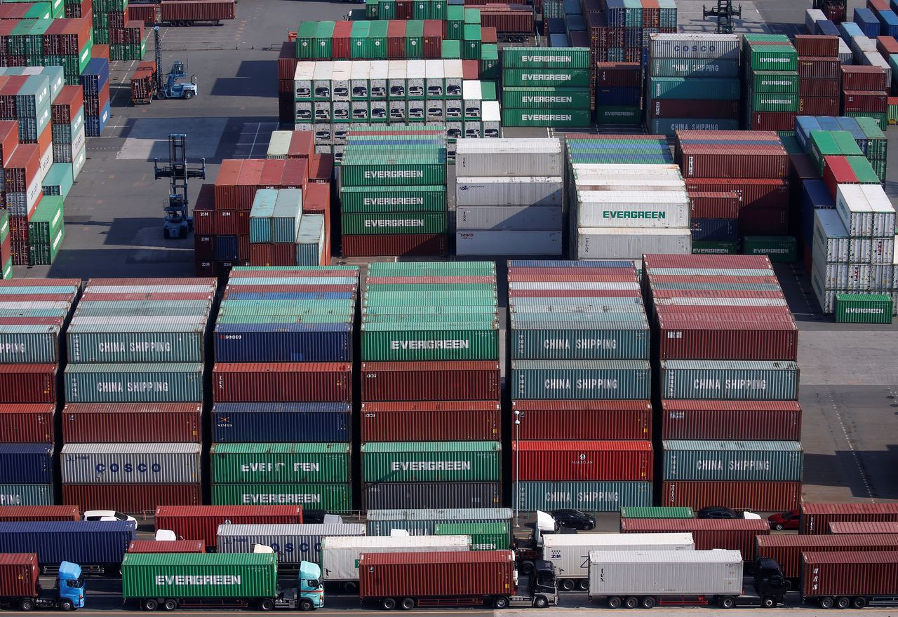 FILE PHOTO: Shipping containers are seen at a port in Tokyo, Japan, March 22, 2017. REUTERS/Issei Kato