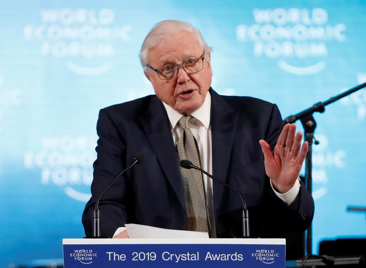 FILE PHOTO: Naturalist Sir David Attenborough delivers a speech as he receives a Crystal Award, during an opening ceremony of the World Economic Forum (WEF) in Davos, Switzerland, January 21, 2019. REUTERS/Arnd Wiegmann/File Photo