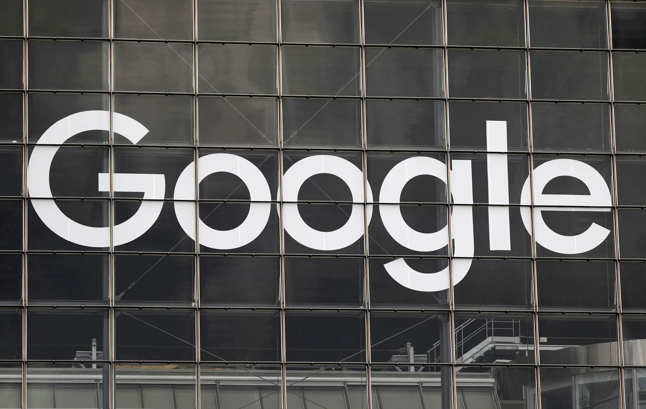 FILE PHOTO: The logo of Google is seen on a building at La Defense business and financial district in Courbevoie near Paris, France, September 1, 2020. REUTERS/Charles Platiau/File Photo