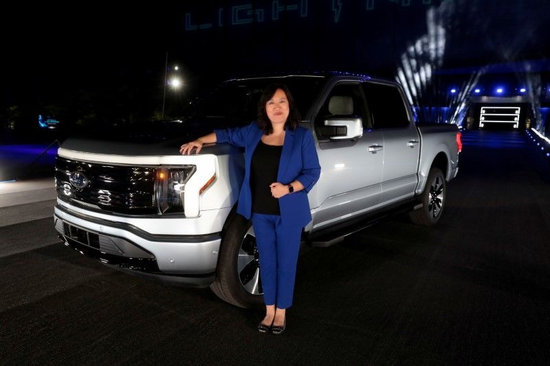 FILE PHOTO: Chief engineer Linda Zhang poses next to the all-electric Ford F-150 Lightning pickup truck during the unveiling at the company
