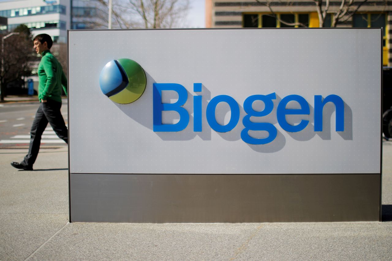 FILE PHOTO: A sign marks a Biogen facility, some of whose employees have tested positive for the coronavirus after attending a meeting in Boston, in Cambridge, Massachusetts, U.S., March 9, 2020. REUTERS/Brian Snyder/File Photo