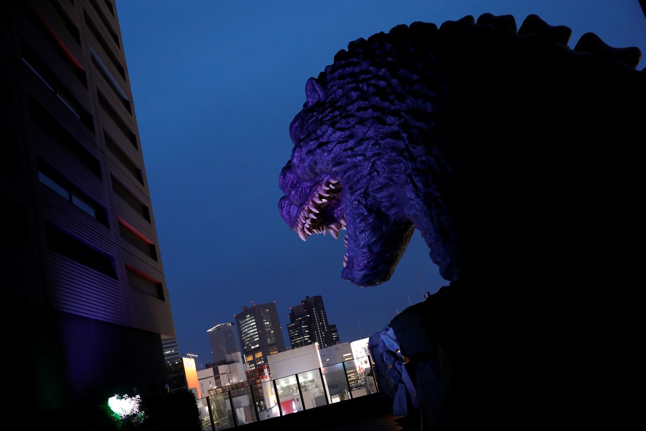 The head of Godzilla is displayed on the 8th floor of Gracery hotel in Kabukicho, a nightlife area in Shinjuku, Tokyo, Japan, June 3, 2021. REUTERS/Androniki Christodoulou