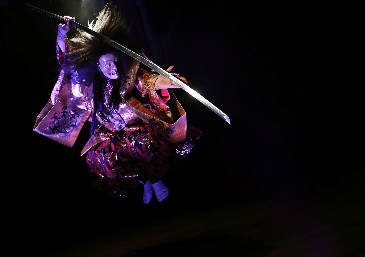 Koshiro Minamoto, the founder of BUGAKU and a Samurai martial arts instructor, performs BUGAKU, a composite Samurai Art of Japanese traditional martial arts and the traditional Japanese performing art Noh, as he poses for a photo before a performance in Tokyo, Japan, April 3, 2021. REUTERS/Kim Kyung-Hoon