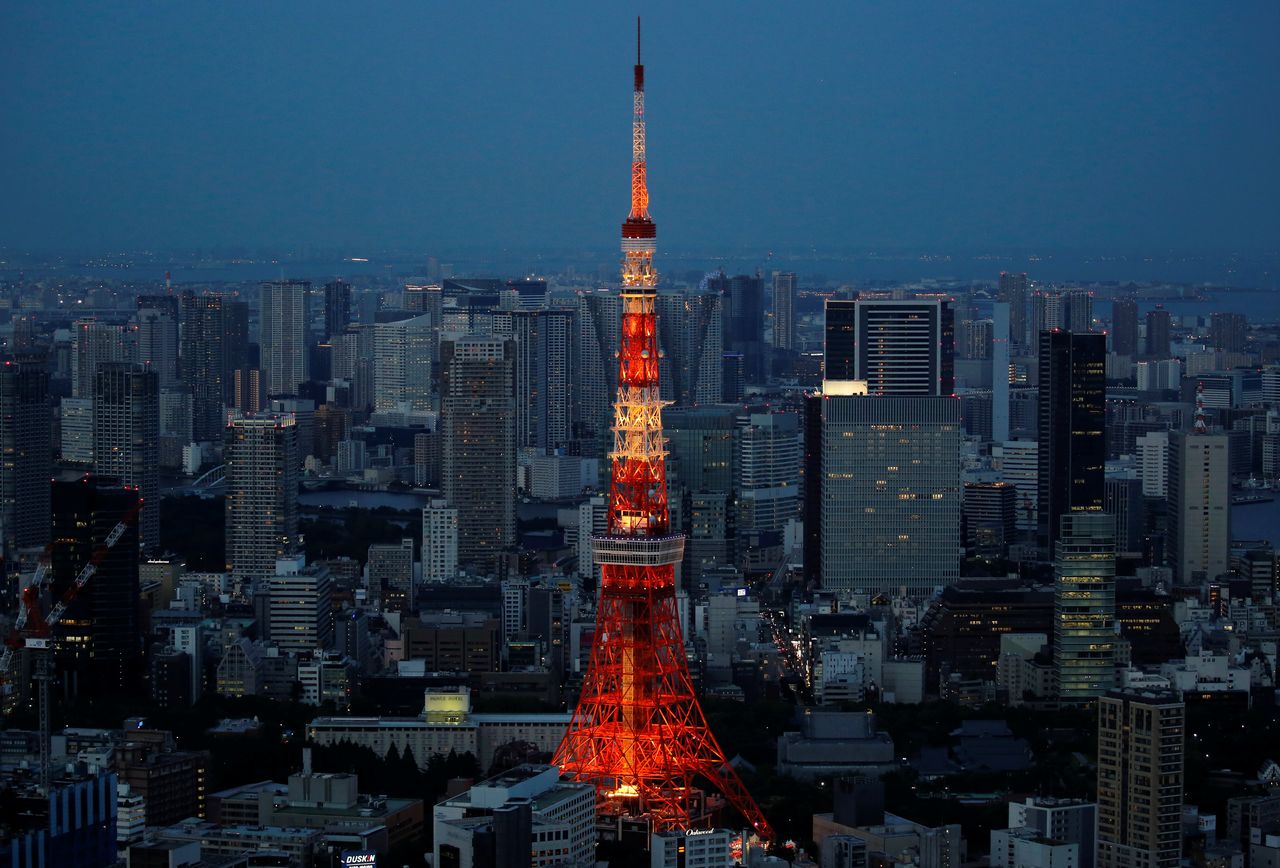 The Tokyo Tower stands as it is pictured from the Sky Deck of Roppongi Hills in Tokyo, Japan, June 2, 2021. REUTERS/Kim Kyung-Hoon