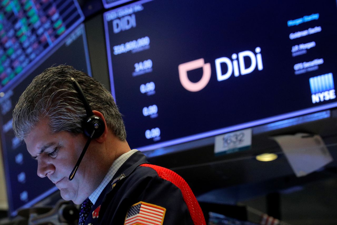 A trader works during the IPO for Chinese ride-hailing company Didi Global Inc on the New York Stock Exchange (NYSE) floor in New York City, U.S., June 30, 2021. REUTERS/Brendan McDermid