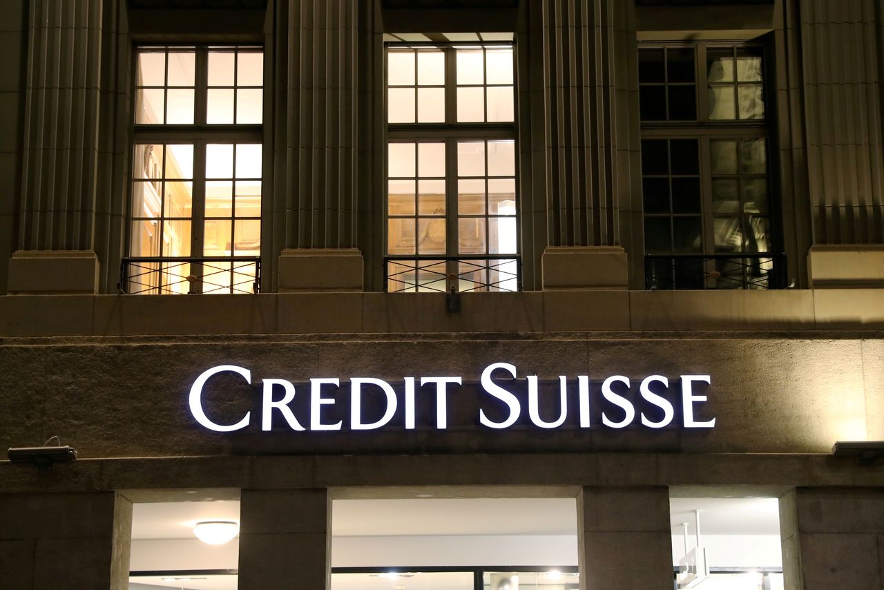 FILE PHOTO: The logo of Swiss bank Credit Suisse is seen at a branch office in Bern, Switzerland October 28, 2020. REUTERS/Arnd Wiegmann