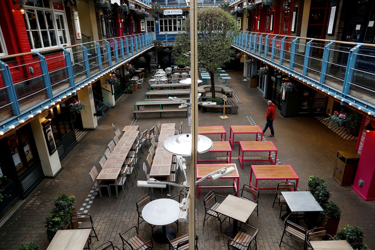 FILE PHOTO: General view of an empty outdoor eating area as the spread of the coronavirus disease (COVID-19) continues. London, Britain March 21, 2020 REUTERS/Peter Nicholls