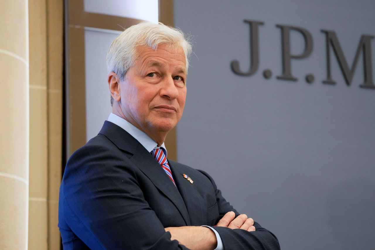 FILE PHOTO: JP Morgan CEO Jamie Dimon looks on during the inauguration the new French headquarters of JP Morgan bank in Paris, France June 29, 2021. Michel Euler/Pool via REUTERS/File Photo