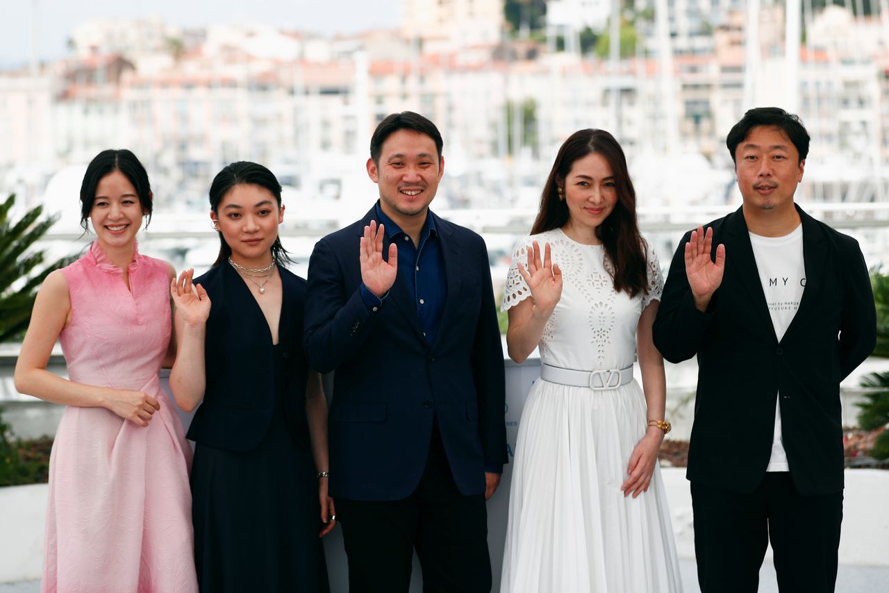 FILE PHOTO: The 74th Cannes Film Festival - Photocall for the film "Doraibu mai ka" (Drive My Car) in competition - Cannes, France, July 12, 2021. Director Ryusuke Hamaguchi, cast members Toko Miura, Sonia Yuan and Reika Kirishima and producer Teruhisa Yamamoto (aka Akihisa Yamamoto) pose. REUTERS/Johanna Geron/File Photo