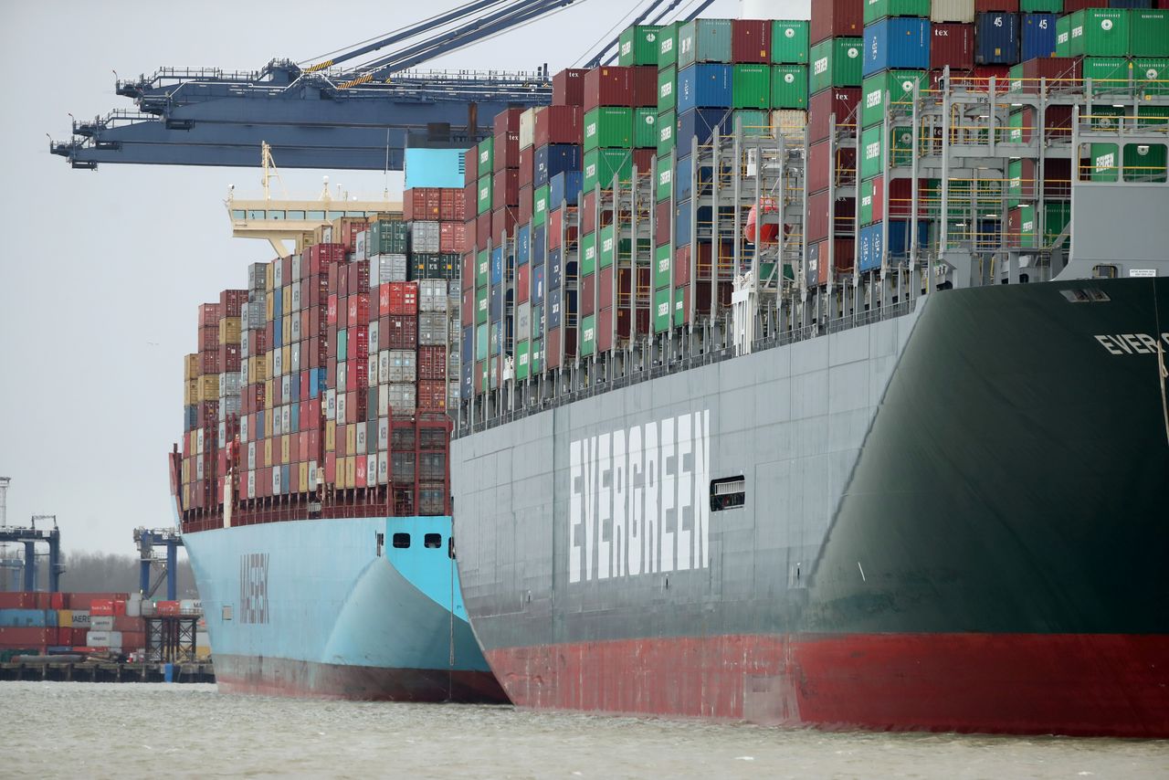 FILE PHOTO: A view of the Port of Felixstowe, as containers are seen aboard the container ship Ever Greet, in Felixstowe, Britain, January 28, 2021. REUTERS/Peter Cziborra/File Photo
