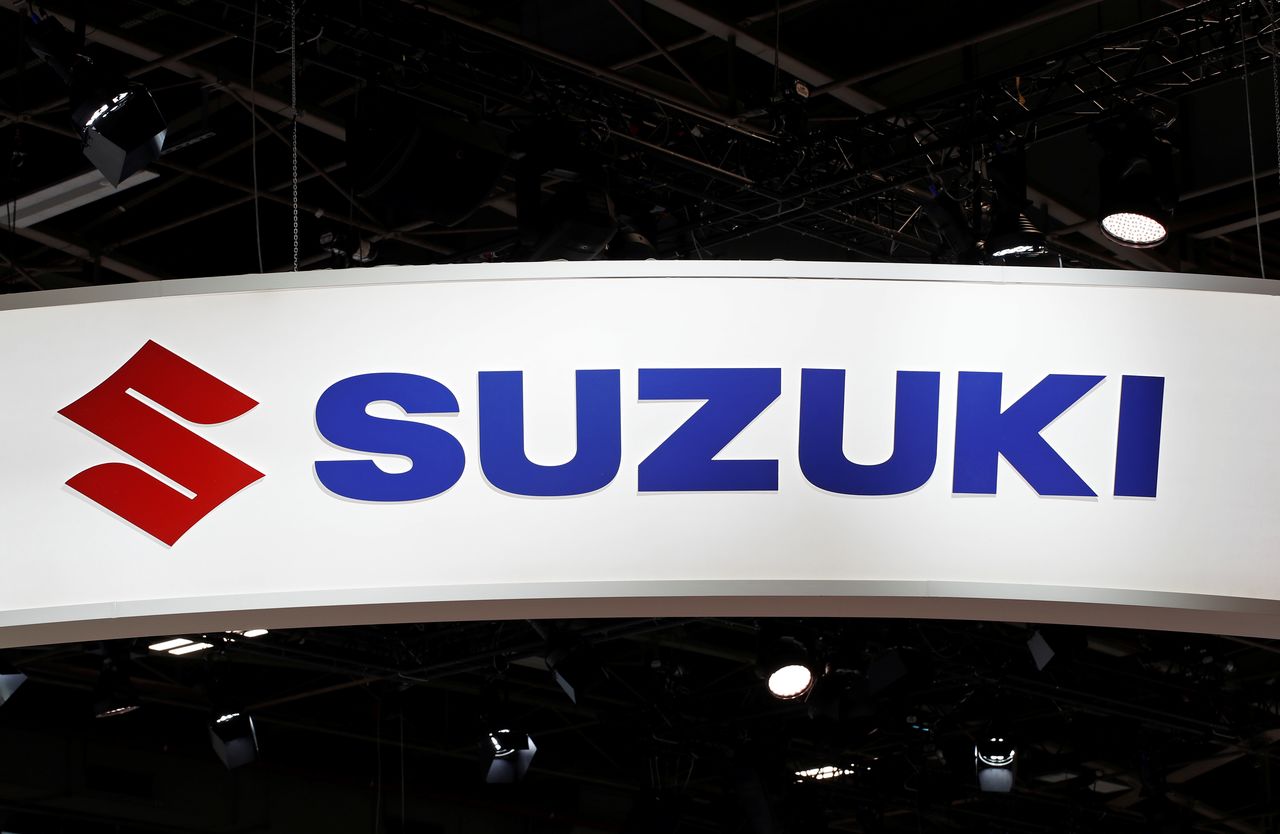 FILE PHOTO: The Suzuki logo is seen during the first press day of the Paris auto show, in Paris, France, October 2, 2018. REUTERS/Benoit Tessier