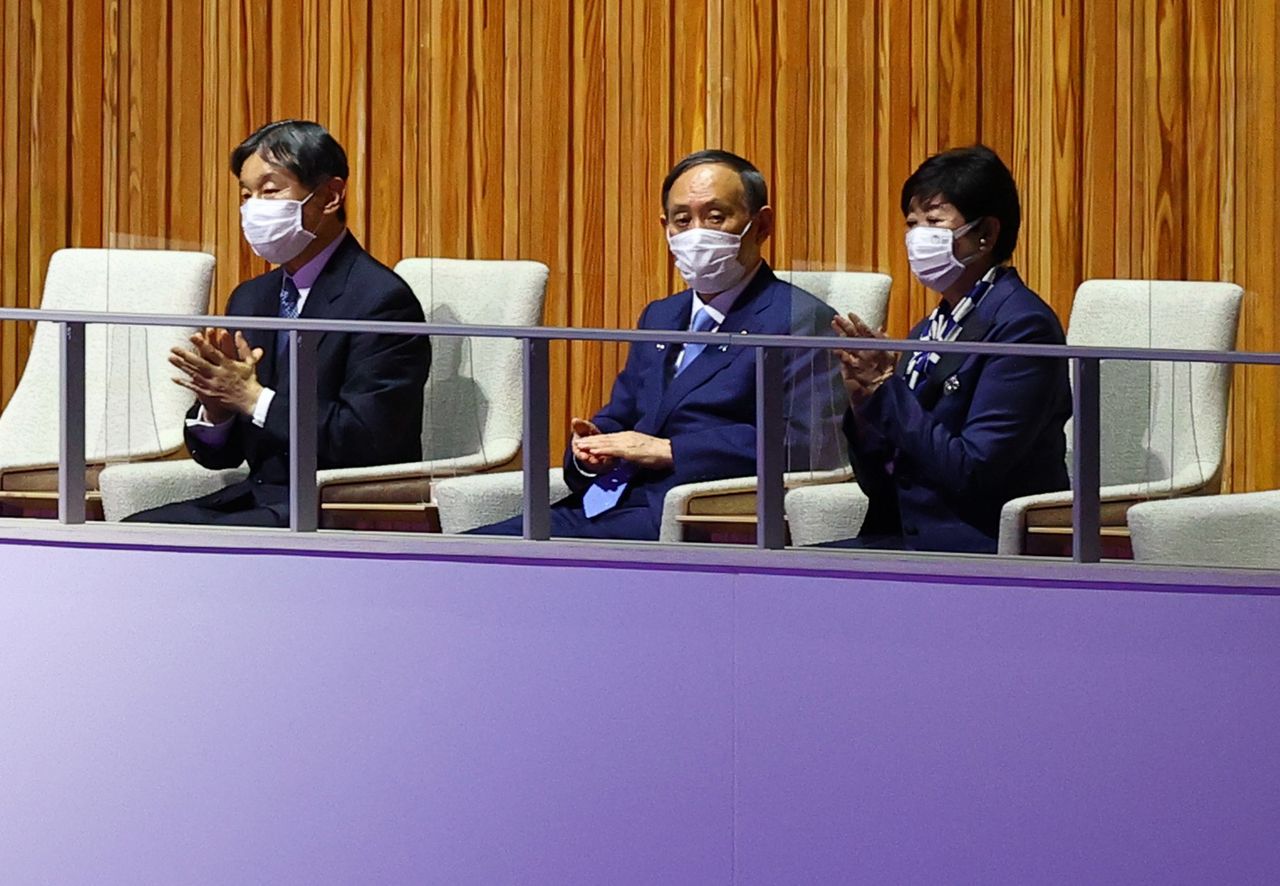 Tokyo 2020 Olympics - The Tokyo 2020 Olympics Opening Ceremony - Olympic Stadium, Tokyo, Japan - July 23, 2021. Japan's Emperor Naruhito listens to the speech of International Olympic Committee (IOC) President Thomas Bach during the opening ceremony REUTERS/Mike Blake