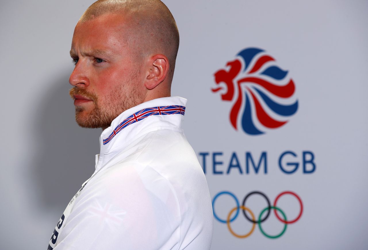 FILE PHOTO: Olympics - Team GB Tokyo 2020 Kitting Out - The National Exhibition Centre, Birmingham, Britain - June 16, 2021 Britain's Adam Peaty poses for a photo Action Images via Reuters/Jason Cairnduff/File Photo