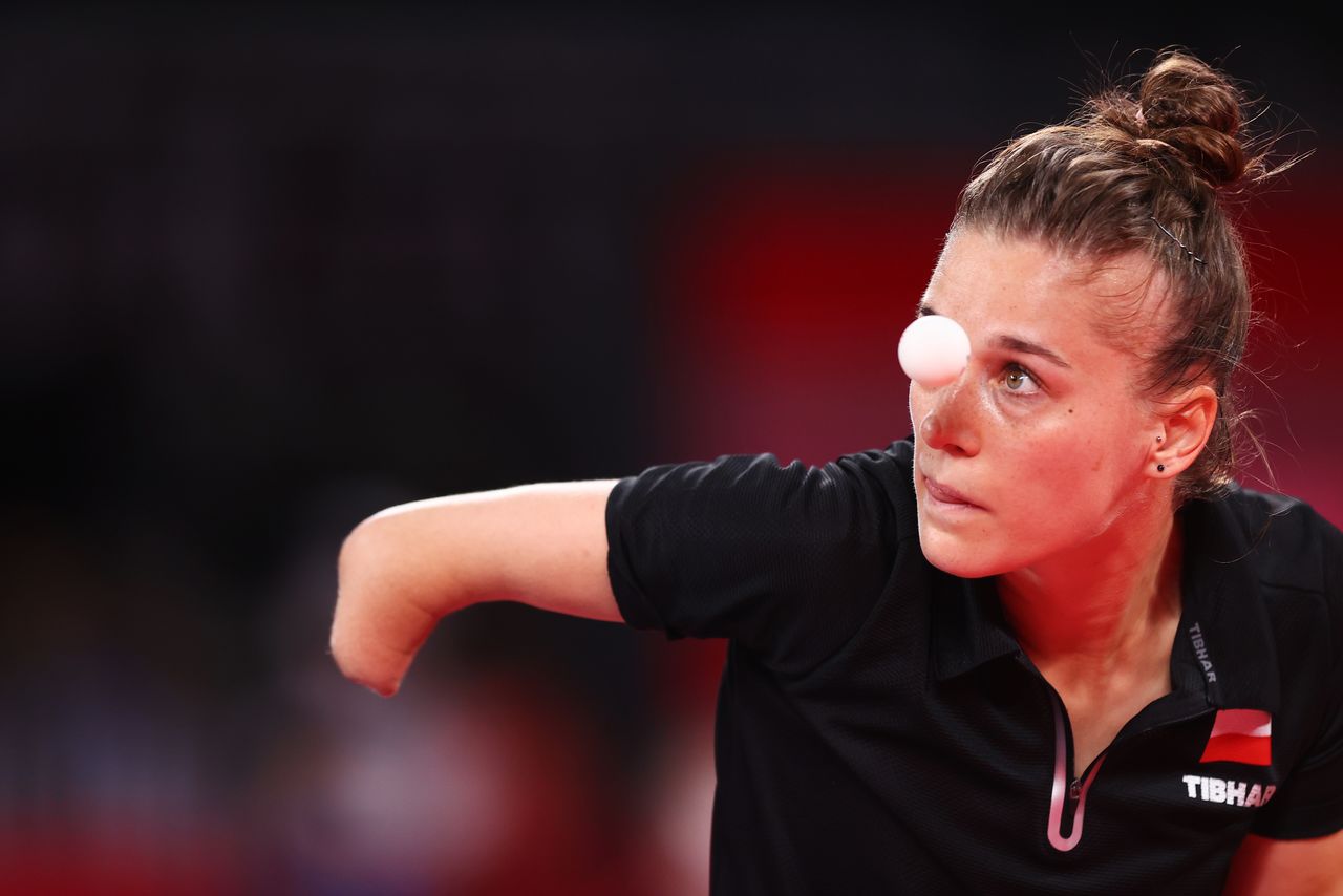 Tokyo 2020 Olympics - Table Tennis - Women's Singles - Round 1 - Tokyo Metropolitan Gymnasium - Tokyo, Japan - July 24, 2021. Natalia Partyka of Poland in action against Michelle Bromley of Australia REUTERS/Luisa Gonzalez