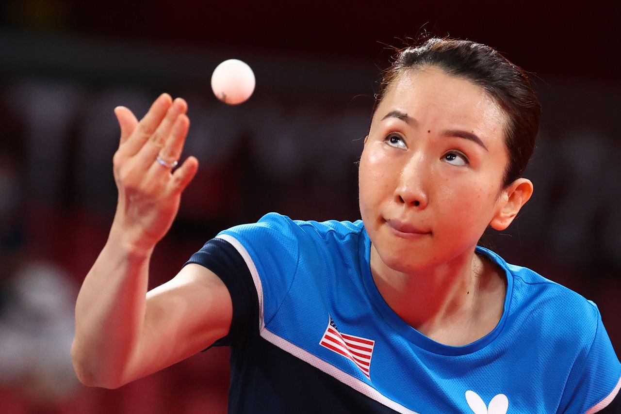 Tokyo 2020 Olympics - Table Tennis - Women's Singles - Preliminary Round - Tokyo Metropolitan Gymnasium - Tokyo, Japan - July 24, 2021. Juan Liu of the United States in action against Olufunke Oshonaike of Nigeria REUTERS/Thomas Peter