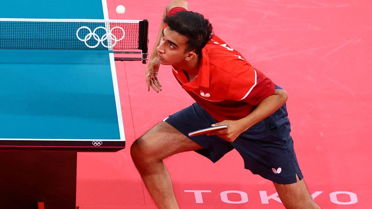 Tokyo 2020 Olympics - Table Tennis - Women's Singles - Preliminary Round - Tokyo Metropolitan Gymnasium - Tokyo, Japan - July 24, 2021. Juan Liu of the United States in action against Olufunke Oshonaike of Nigeria REUTERS/Thomas Peter