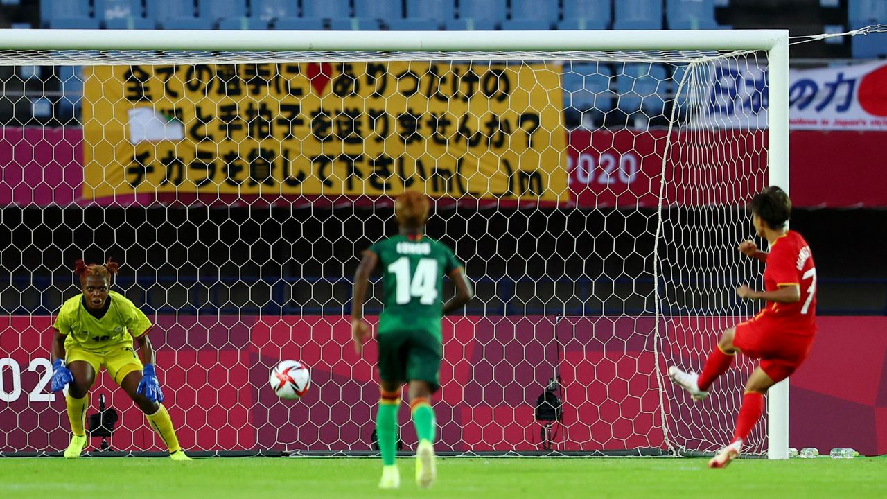 Tokyo 2020 Olympics - Soccer Football - Women - Group F - China v Zambia - Miyagi Stadium, Miyagi, Japan - July 24, 2021. Wang Shuang of China scores their fourth goal from the penalty spot REUTERS/Amr Abdallah Dalsh