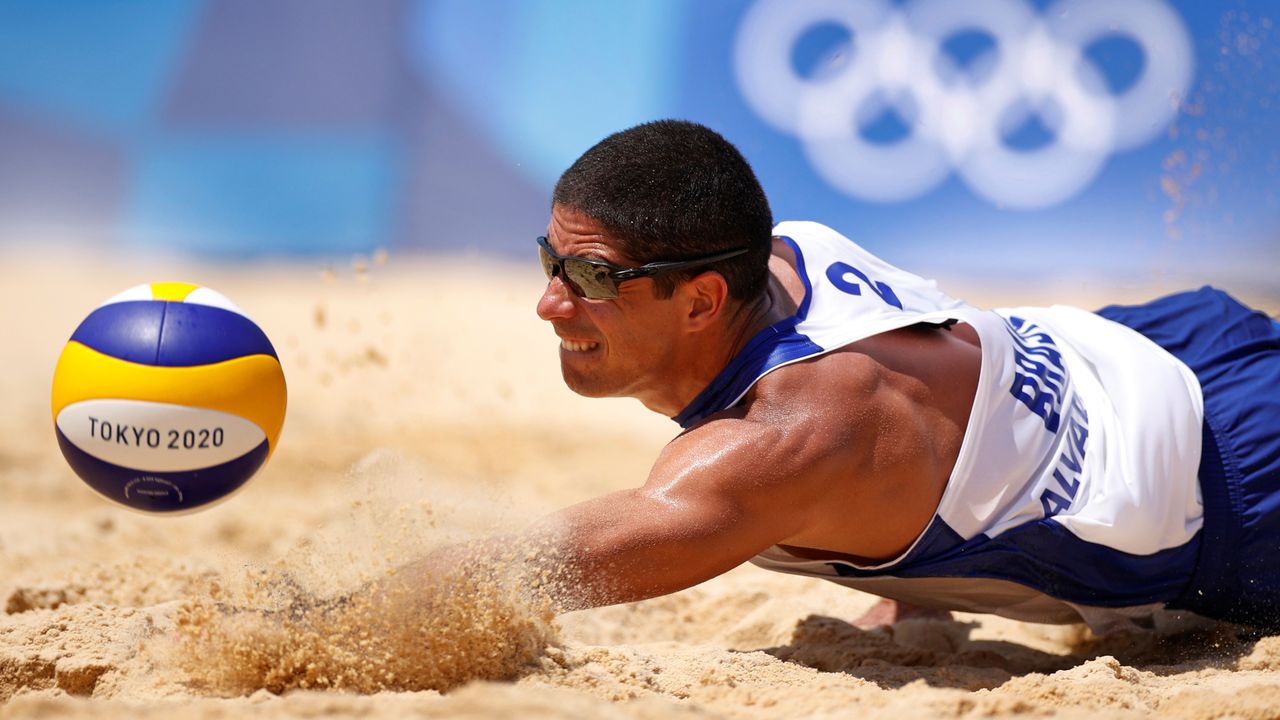 Tokyo 2020 Olympics - Beach Volleyball - Men - Pool D - Brazil (Alison/Alvaro Filho) - Argentina (Azaad/Capogrosso) - Shiokaze Park, Tokyo, Japan - July 24, 2021. Alvaro Filho of Brazil in action. REUTERS/John Sibley