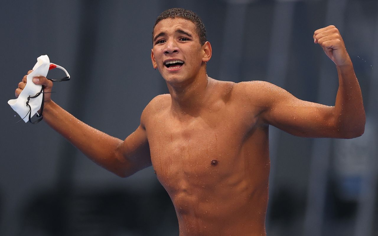 Tokyo 2020 Olympics - Swimming - Men's 400m Freestyle - Final - Tokyo Aquatics Centre - Tokyo, Japan - July 25, 2021. Ahmed Hafnaoui of Tunisia celebrates after winning REUTERS/Marko Djurica