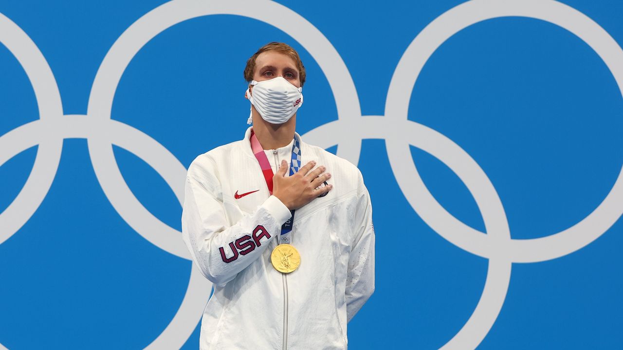 Tokyo 2020 Olympics - Swimming - Men's 400m Individual Medley - Medal Ceremony - Tokyo Aquatics Centre - Tokyo, Japan - July 25, 2021. Gold medalist Chase Kalisz of the United States celebrates on the podium REUTERS/Kai Pfaffenbach