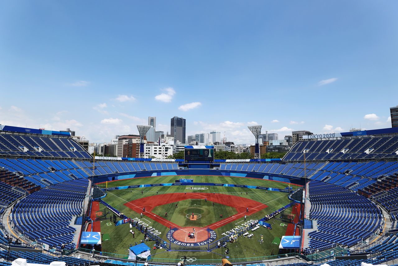 Tokyo 2020 Olympics - Softball - Women - Opening Round - Australia v Canada - Yokohama Baseball Stadium - Yokohama, Japan - July 24, 2021. Empty stands are seen during play at the Yokohama Baseball Stadium as spectators are not allowed due to the coronavirus disease (COVID-19) pandemic. REUTERS/Jorge Silva