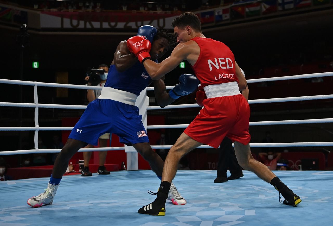 FILE PHOTO: Tokyo 2020 Olympics - Boxing - Men's Lightweight - Last 32 - Kokugikan Arena - Tokyo, Japan - July 25, 2021. Enrico La Cruz of the Netherlands in action against Keyshawn Davis of the United States Pool via REUTERS/Luis Robayo