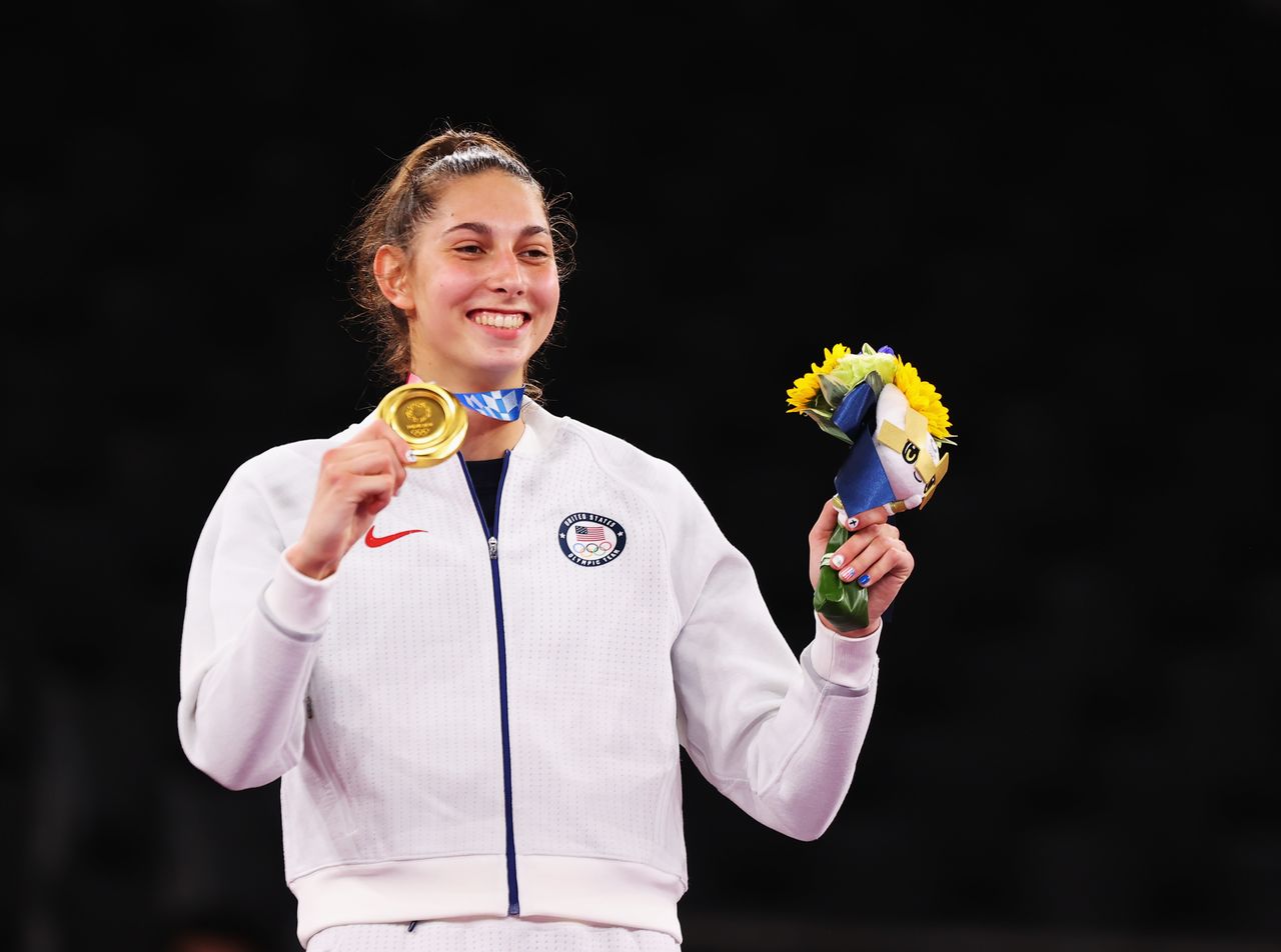 Tokyo 2020 Olympics - Taekwondo - Women's Featherweight 49-57kg - Medal Ceremony - Makuhari Messe Hall A, Chiba, Japan - July 25, 2021. Anastasija Zolotic of the United States celebrates winning gold REUTERS/Murad Sezer