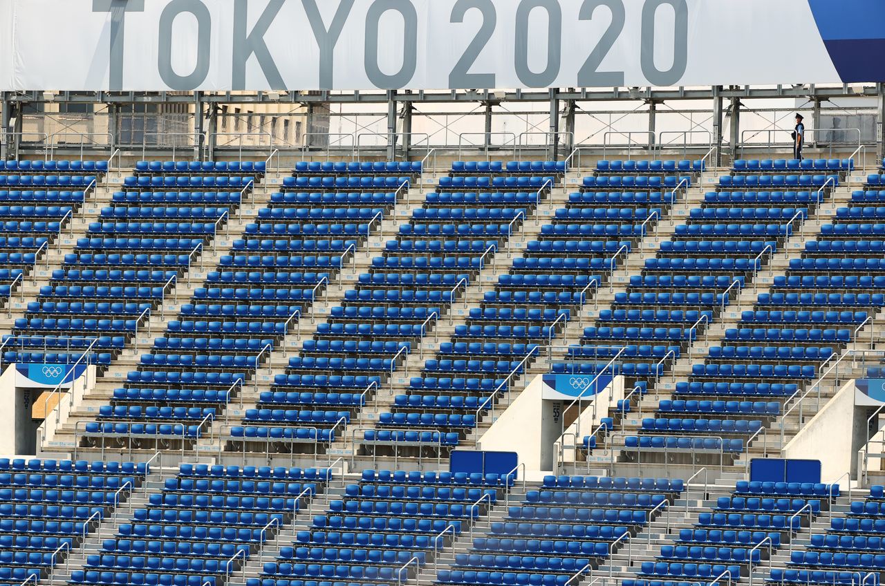 FILE PHOTO: Tokyo 2020 Olympics - Softball - Women - Opening Round - Australia v Canada - Yokohama Baseball Stadium - Yokohama, Japan - July 24, 2021. Empty stands at the Yokohama Baseball Stadium as spectators are not allowed due to the coronavirus disease (COVID-19) pandemic. REUTERS/Jorge Silva