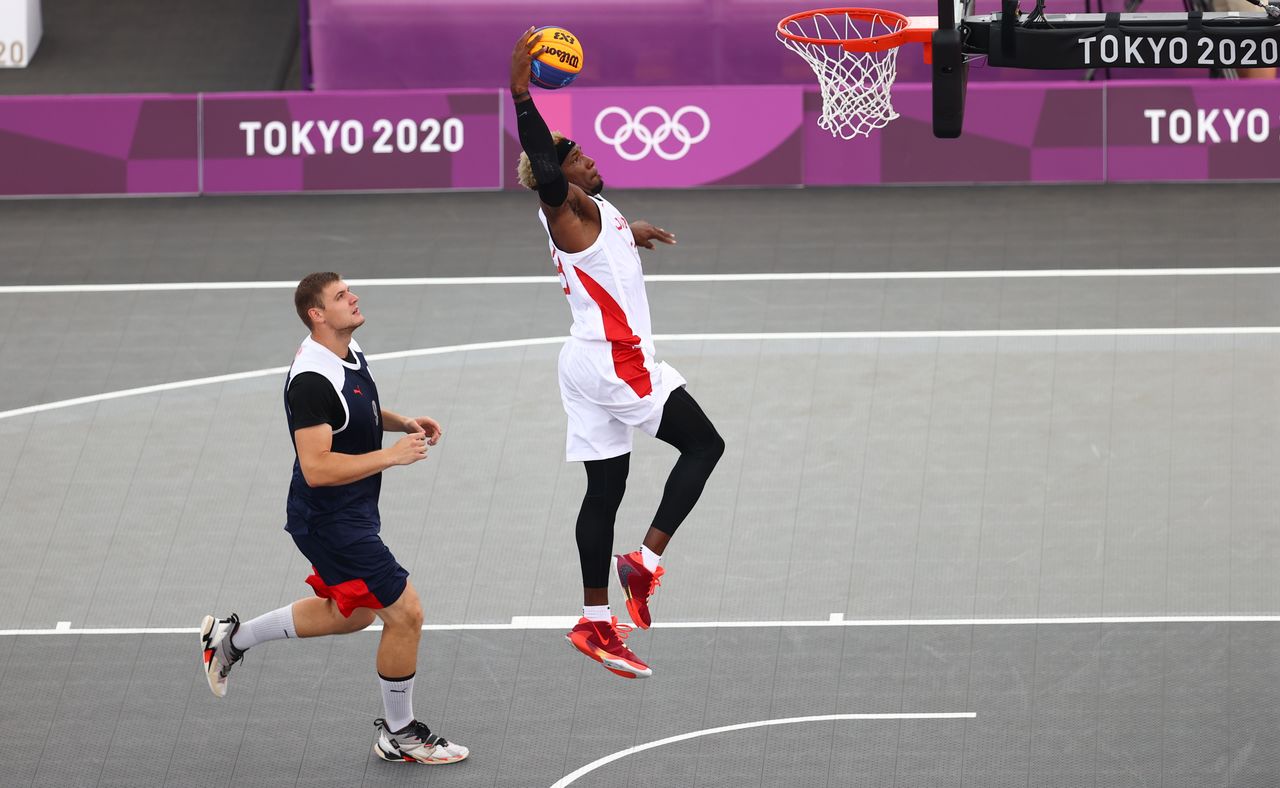 Tokyo 2020 Olympics - Basketball 3x3 - Men - Pool A - Japan v Russian Olympic Committee - Aomi Urban Sports Park, Tokyo, Japan - July 26, 2021. Ira Brown of Japan in action during a match. REUTERS/Andrew Boyers