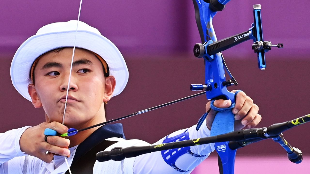 Tokyo 2020 Olympics - Archery - Men's Team - Semifinal 1 - Yumenoshima Archery Field, Tokyo, Japan - July 26, 2021. Kim Je Deok of South Korea in action REUTERS/Clodagh Kilcoyne