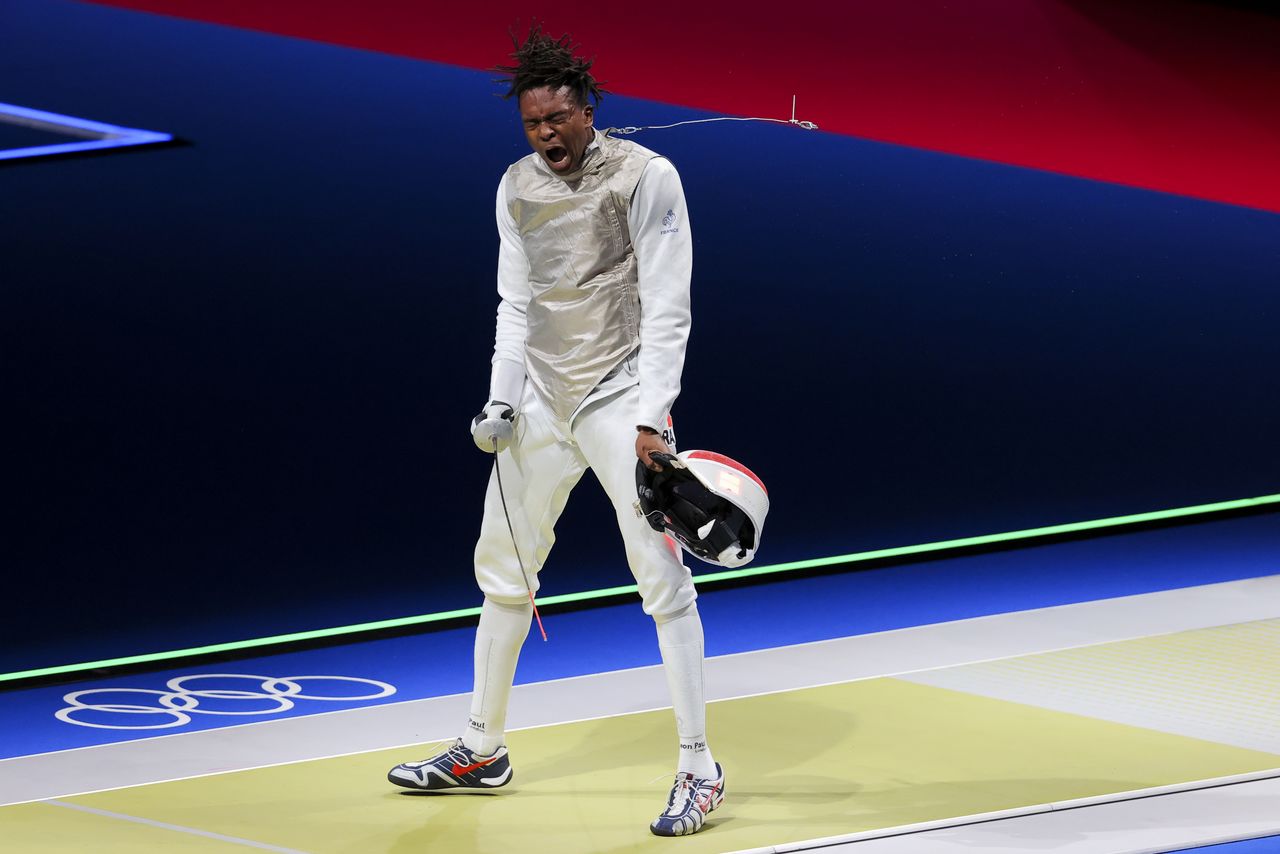 Tokyo 2020 Olympics - Fencing - Men's Individual Foil - Last 16 - Makuhari Messe Hall B - Chiba, Japan - July 26, 2021. Enzo Lefort of France celebrates after competing REUTERS/Maxim Shemetov
