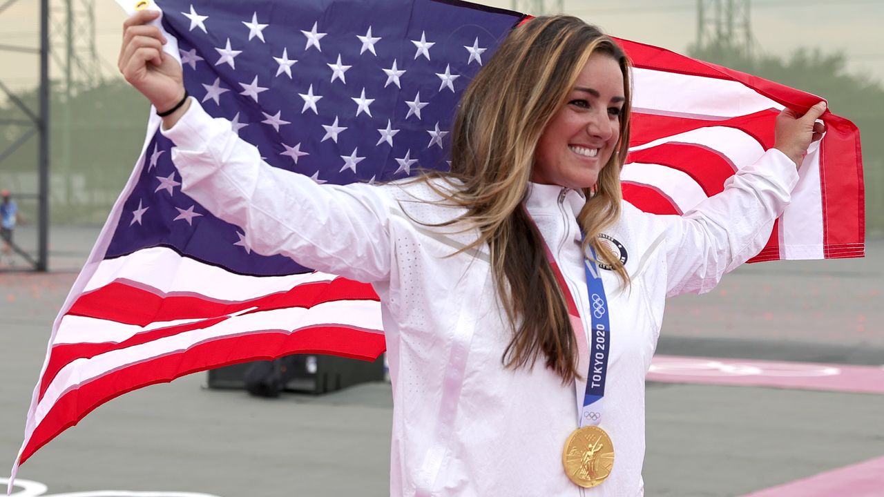 Tokyo 2020 Olympics - Shooting - Women's Skeet - Medal Ceremony - Asaka Shooting Range, Tokyo, Japan - July 26, 2021. Gold medalist Amber English of the United States celebrates REUTERS/Ann Wang