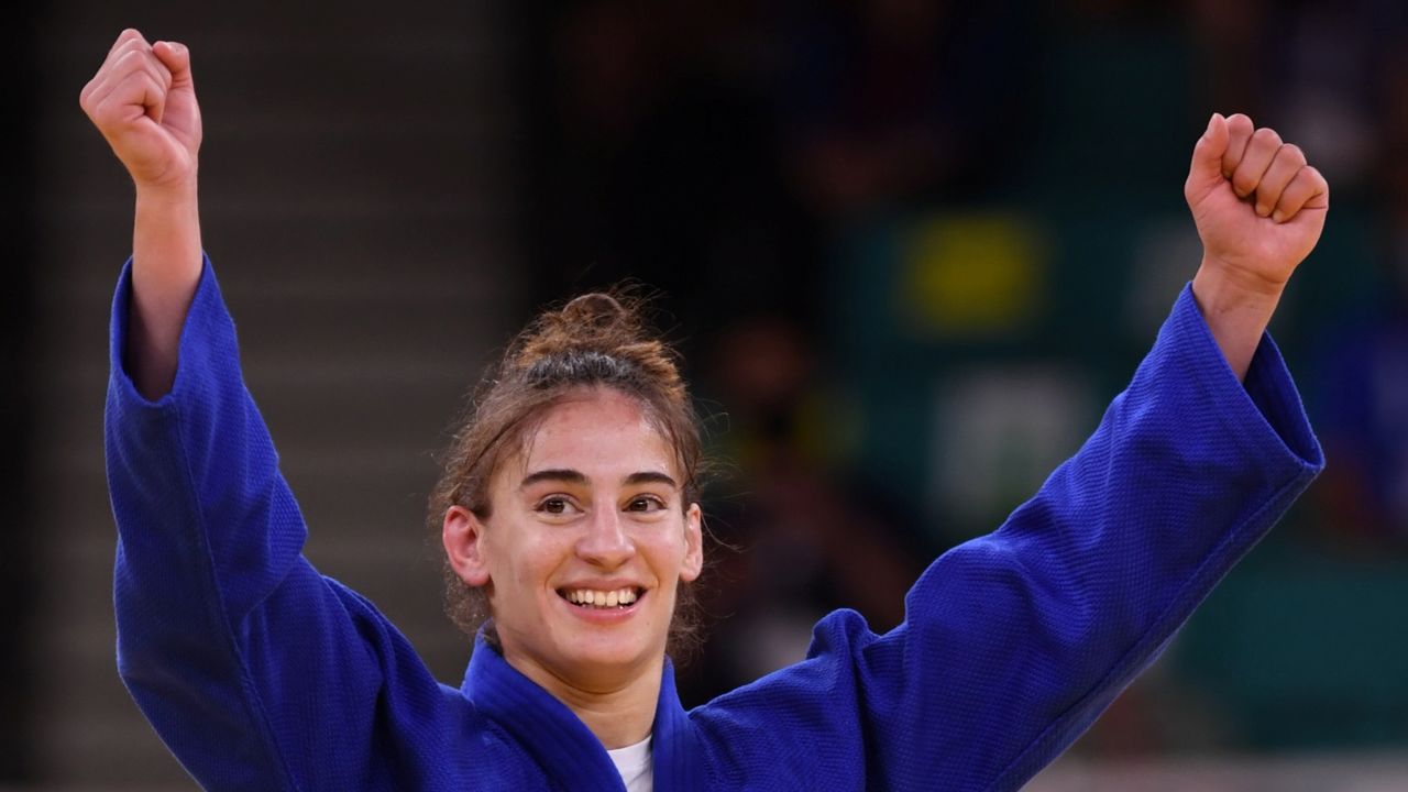 Tokyo 2020 Olympics - Judo - Women's 57kg - Gold medal match - Nippon Budokan - Tokyo, Japan - July 26, 2021. Nora Gjakova of Kosovo celebrates after winning gold against Sarah Leonie Cysique of France REUTERS/Annegret Hilse