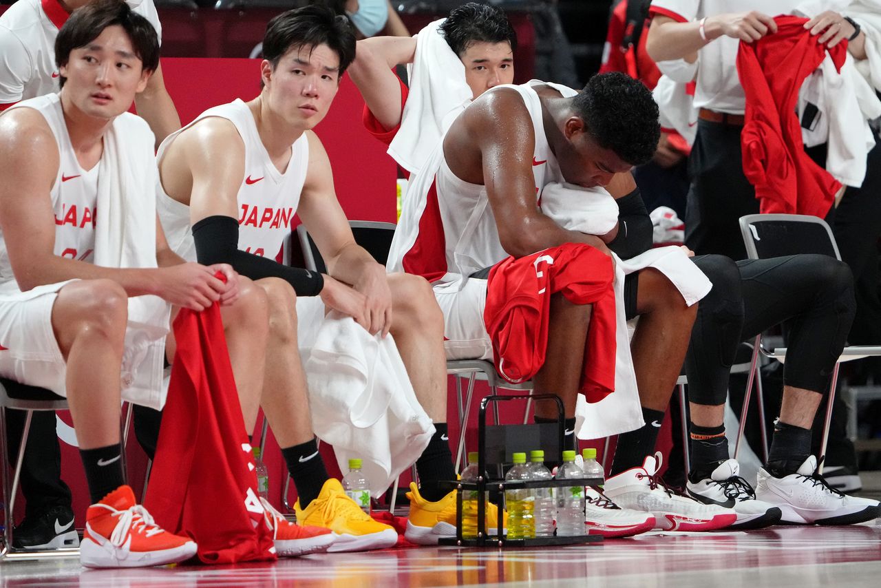 Jul 26, 2021; Saitama, Japan; Team Japan small forward Rui Hachimura (8) reacts while sitting on the bench during the fourth quarter against Spain in men's basketball Group C play during the Tokyo 2020 Olympic Summer Games at Saitama Super Arena. Mandatory Credit: Kyle Terada-USA TODAY Sports