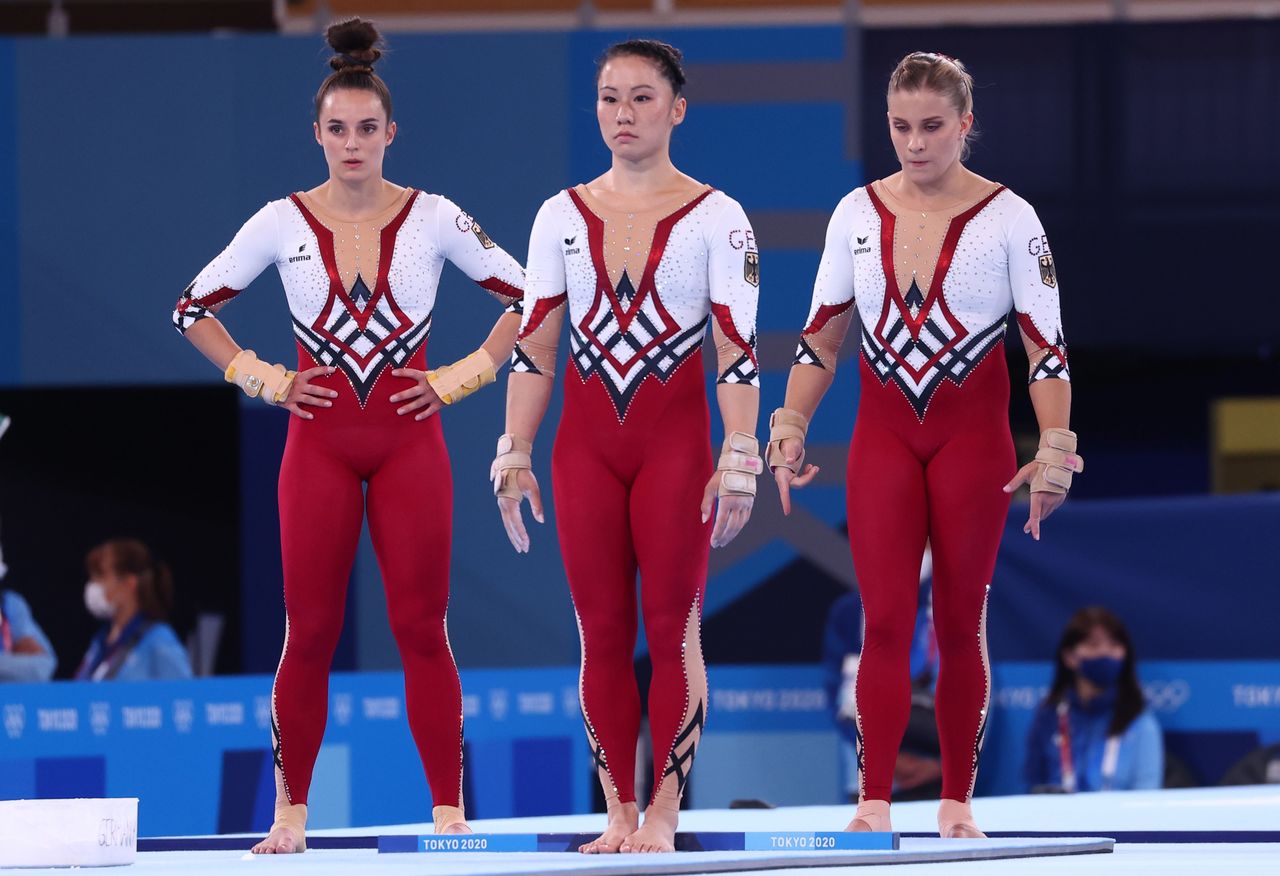 Tokyo 2020 Olympics - Gymnastics - Artistic - Women's Vault - Qualification - Ariake Gymnastics Centre, Tokyo, Japan - July 25, 2021. Kim Bui of Germany, Pauline Schaefer of Germany and Elisabeth Seitz of Germany are seen in their unitards REUTERS/Mike Blake