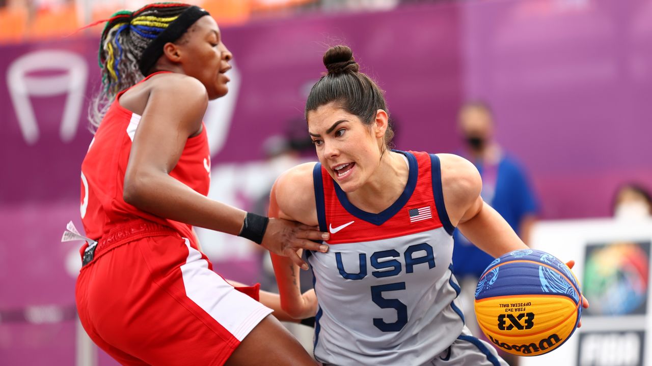 Tokyo 2020 Olympics - Basketball 3x3 - Women - Pool A - United States v Japan - Aomi Urban Sports Park, Tokyo, Japan - July 27, 2021. Stephanie Mawuli of Japan in action with Kelsey Plum of the United States during a match. REUTERS/Andrew Boyers