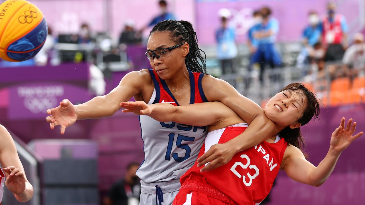 Tokyo 2020 Olympics - Basketball 3x3 - Women - Pool A - United States v Japan - Aomi Urban Sports Park, Tokyo, Japan - July 27, 2021. Allisha Gray of the United States in action with Risa Nishioka of Japan and Mai Yamamoto of Japan during a match. REUTERS/Andrew Boyers