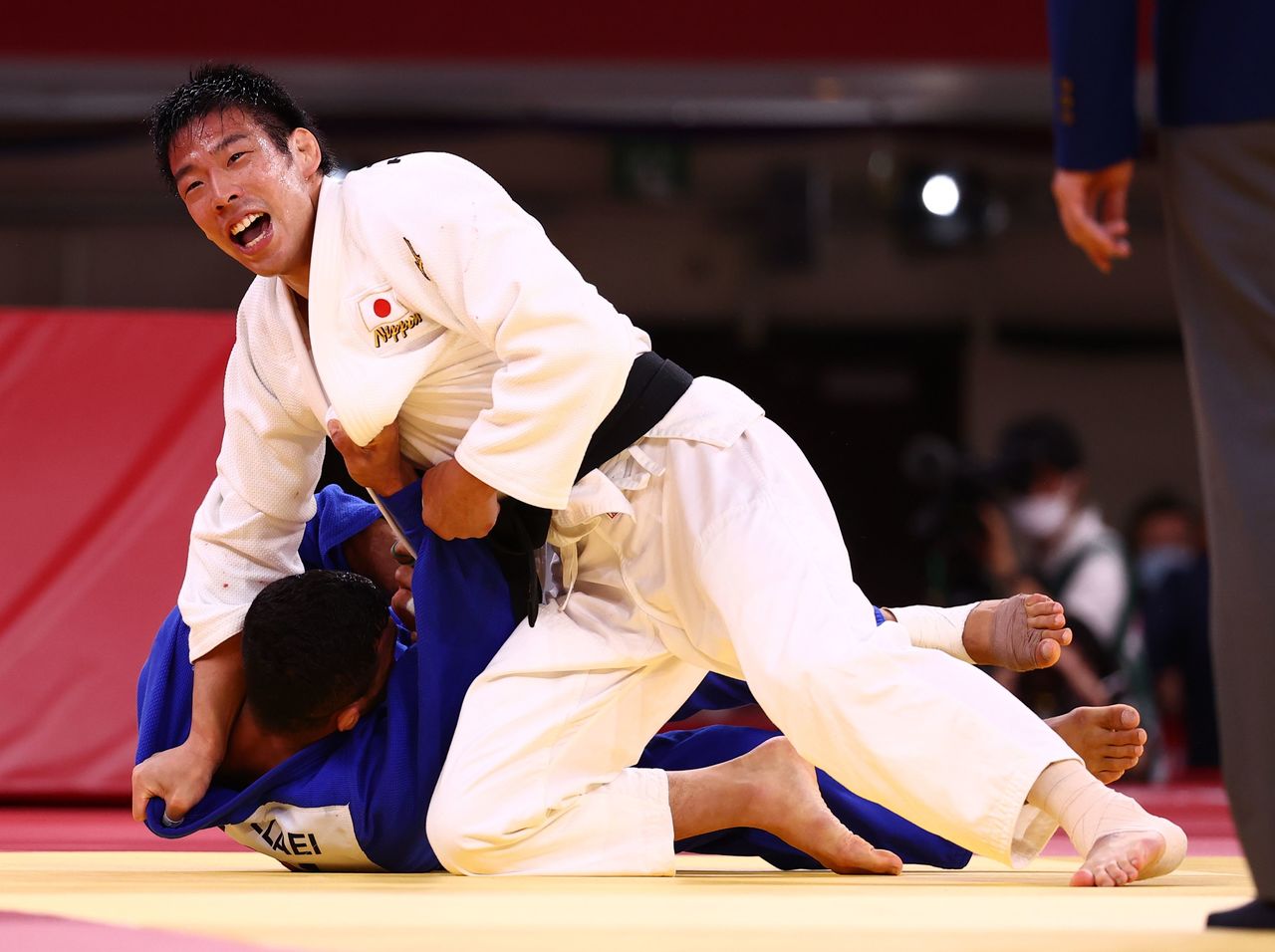 FILE PHOTO: Tokyo 2020 Olympics - Judo - Men's 81kg - Gold medal match - Nippon Budokan - Tokyo, Japan - July 27, 2021. Takanori Nagase of Japan reacts after winning gold against Saeid Mollaei of Mongolia REUTERS/Sergio Perez