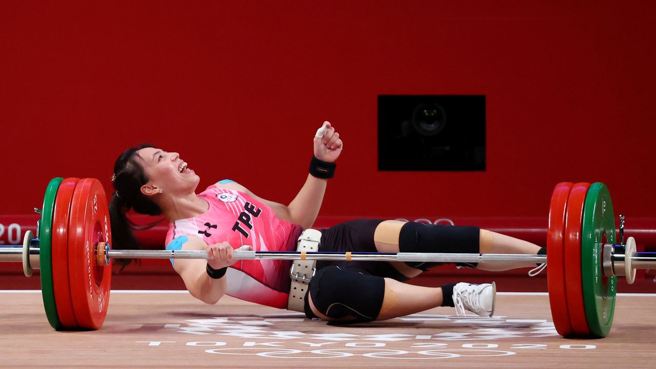 Tokyo 2020 Olympics - Weightlifting - Women's 59kg - Group A - Tokyo International Forum, Tokyo, Japan - July 27, 2021. Kuo Hsing-Chun of Taiwan reacts after failing a lift. REUTERS/Edgard Garrido