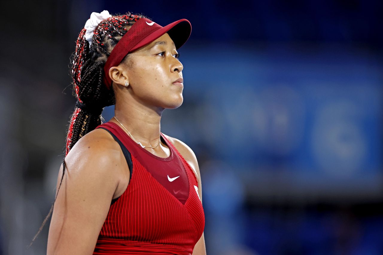 Jul 27, 2021; Tokyo, Japan; Naomi Osaka (JPN) reacts during her match against Marketa Vondrousova (CZE) in the women's tennis third round singles during the Tokyo 2020 Olympic Summer Games at Ariake Tennis Park. Mandatory Credit: Yukihito Taguchi-USA TODAY Sports