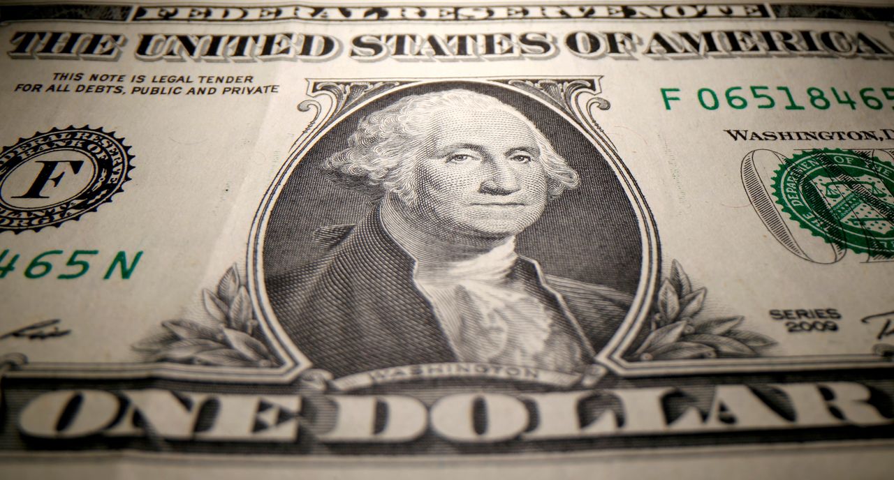 FILE PHOTO: A U.S. dollar banknote is seen in this illustration taken May 26, 2020. REUTERS/Dado Ruvic/Illustration
