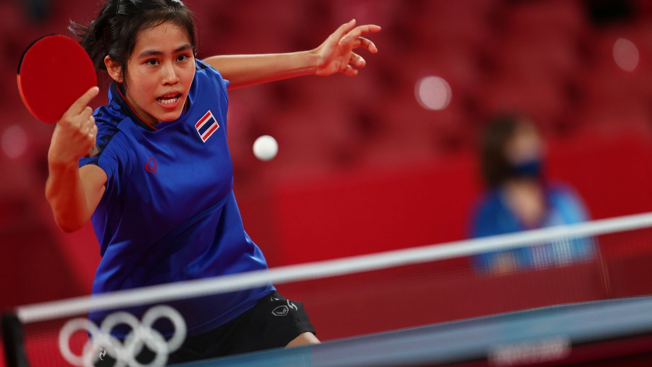 Tokyo 2020 Olympics - Table Tennis - Women's Singles - Last 16 - Tokyo Metropolitan Gymnasium - Tokyo, Japan - July 27, 2021. Suthasini Sawettabut of Thailand in action against Mima Ito of Japan REUTERS/Luisa Gonzalez