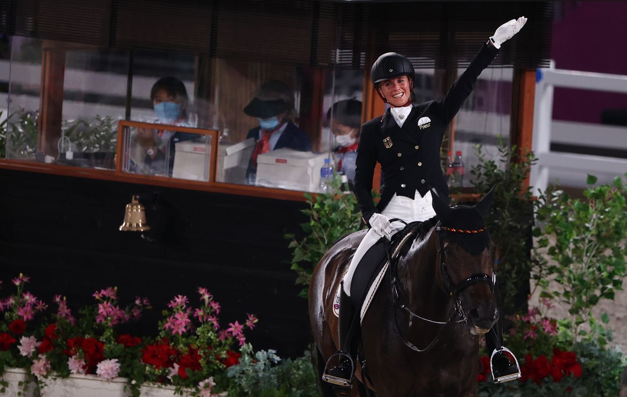 Tokyo 2020 Olympics - Equestrian - Dressage - Grand Prix Special - Team - Equestrian Park - Tokyo, Japan - July 27, 2021. Jessica von Bredow-Werndl of Germany on her horse TSF Dalera reacts. REUTERS/Hamad I Mohammed