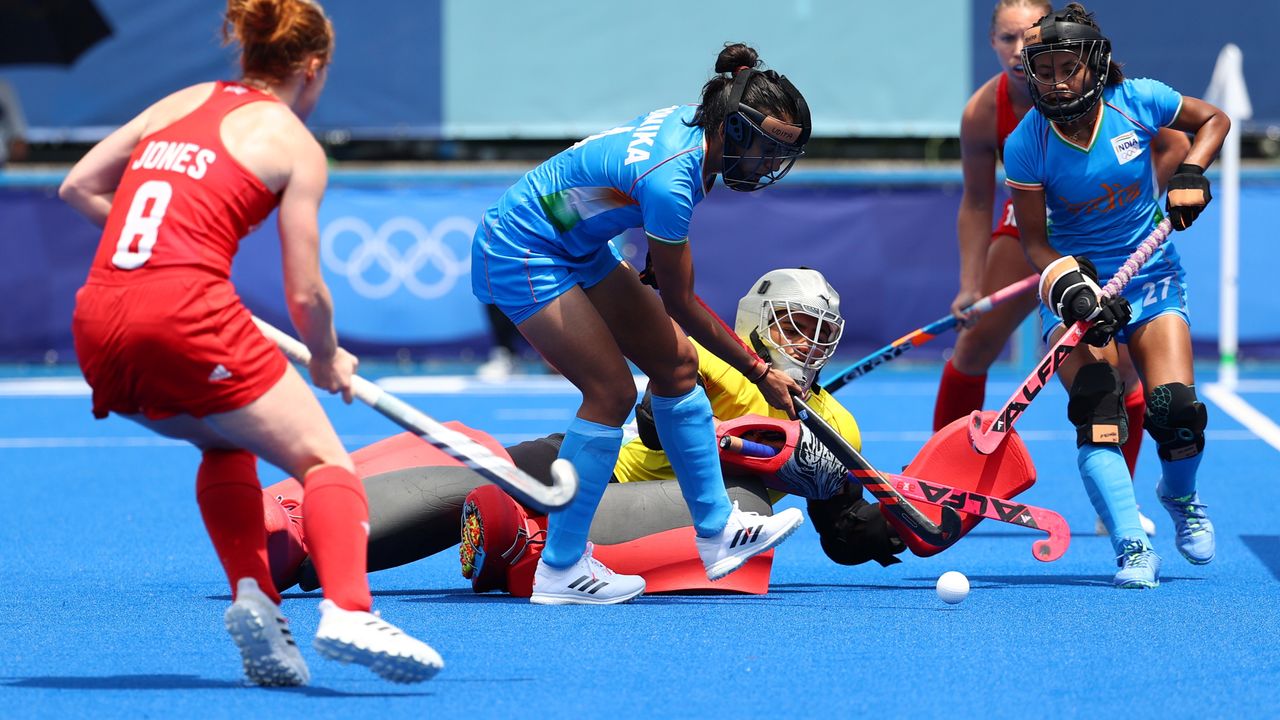 Tokyo 2020 Olympics - Hockey - Women's Pool A - Britain v India - Oi Hockey Stadium, Tokyo, Japan - July 28, 2021. Monika Malik of India in action as they defend. REUTERS/Bernadett Szabo